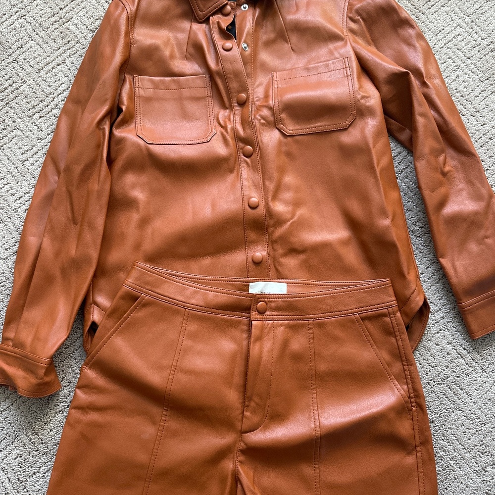 Anthropologie faux leather set.